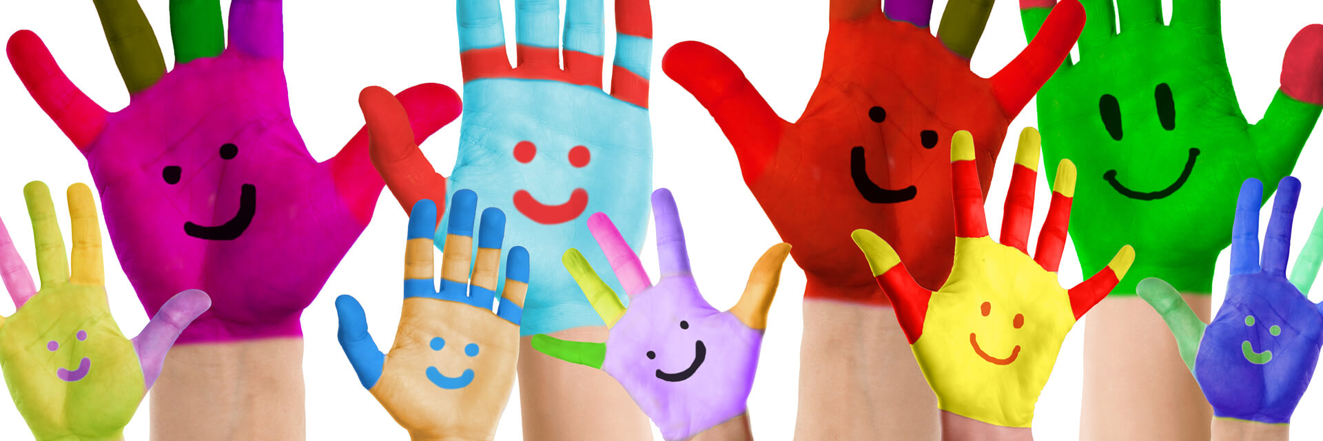 Many different hands coloured with smiley faces