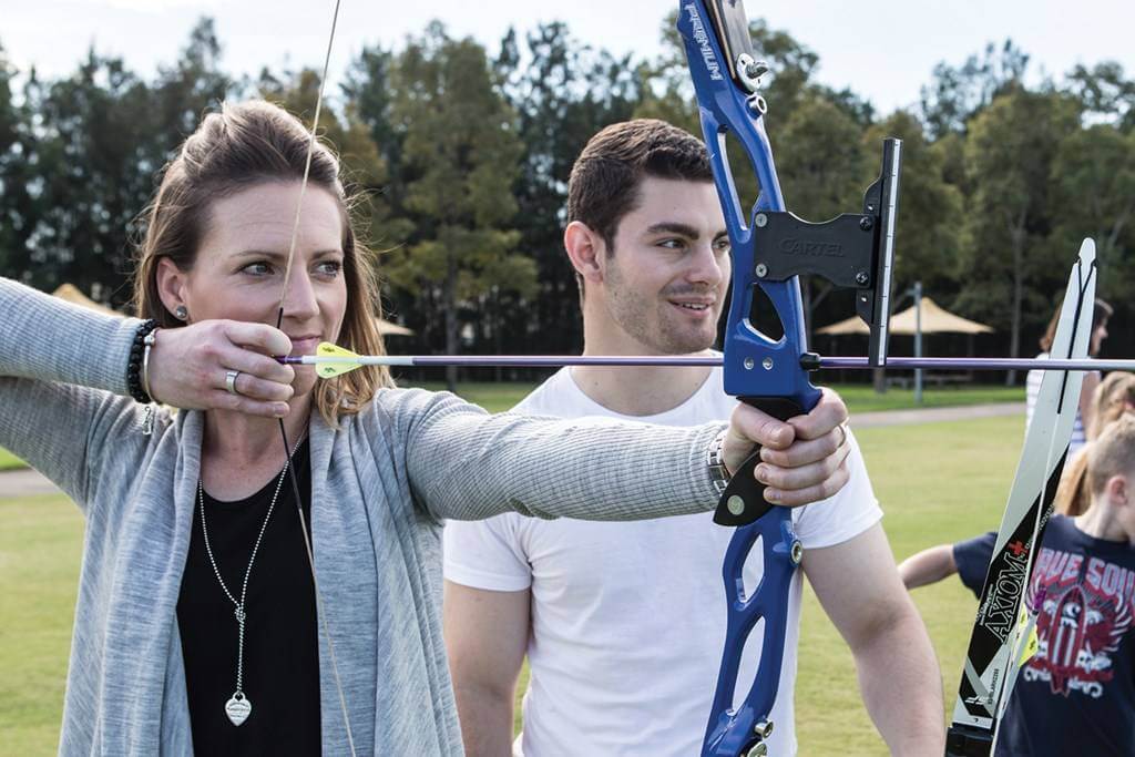 Adults learning beginners Archery