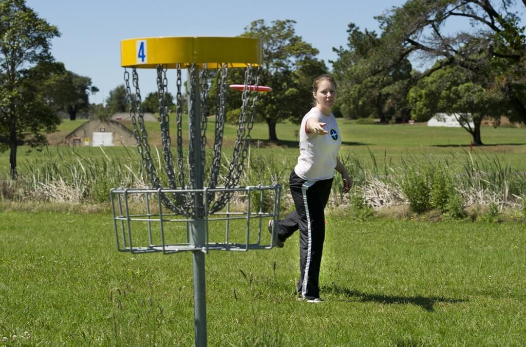 Person playing disc golf