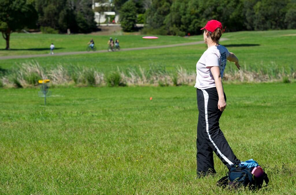 Person playing disc golf